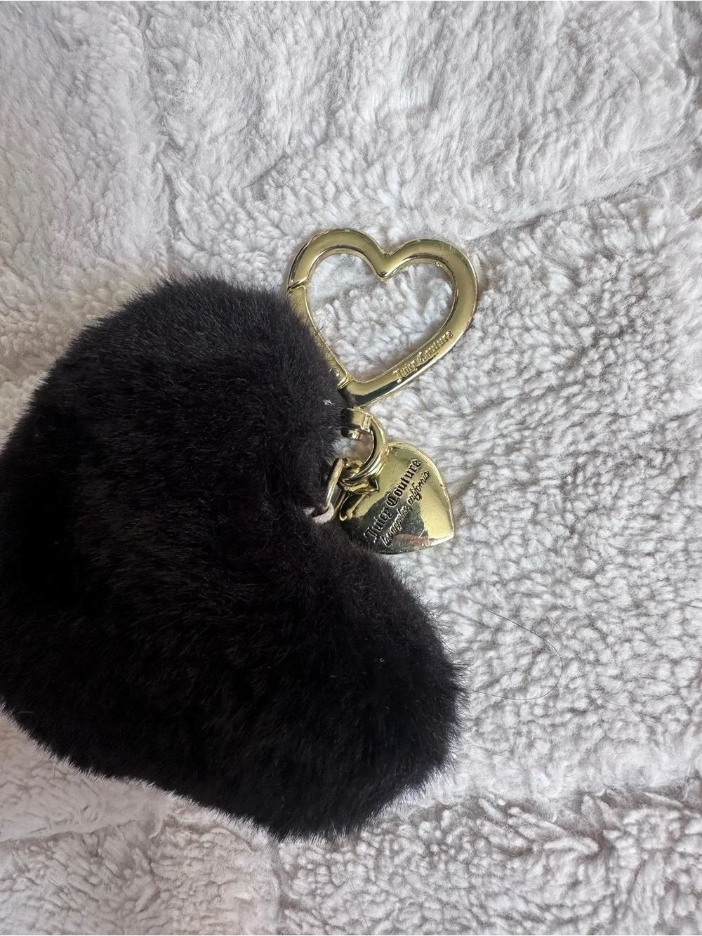 Juicy Couture | Black faux fur heart keychain charm featuring gold-tone Hardwear
